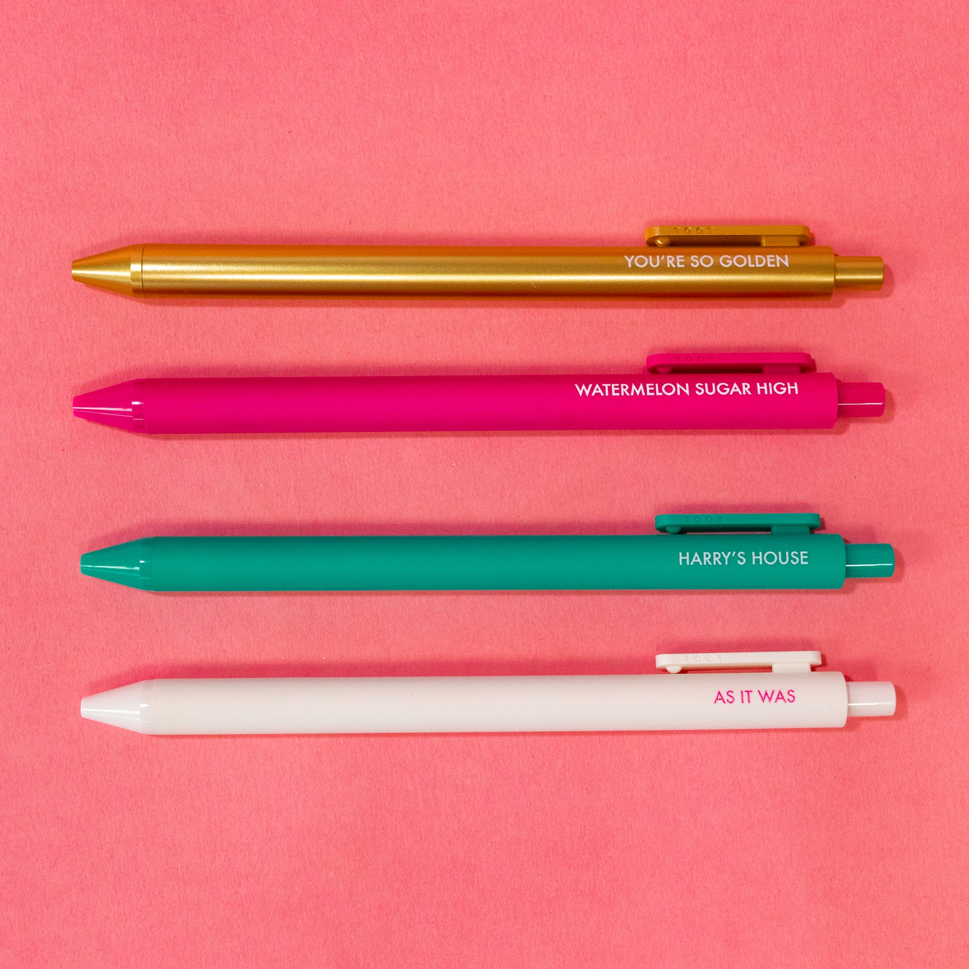 four colorful harry styles pens