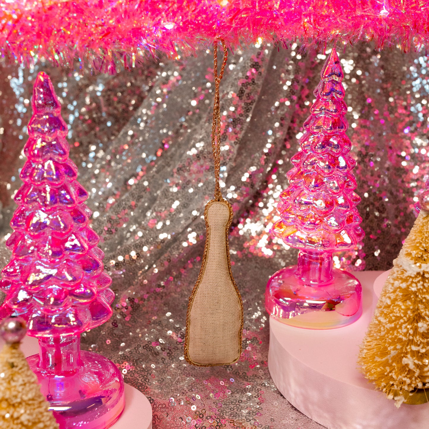 pink christmas trees with sequin background