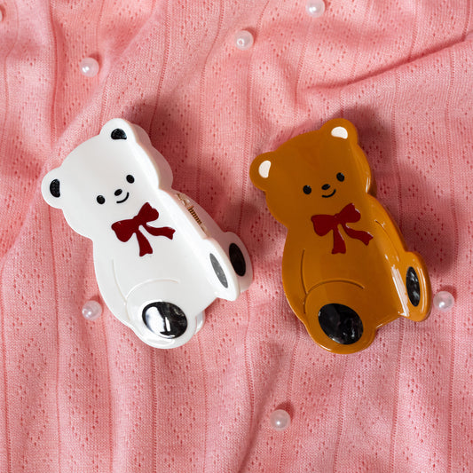 brown and white teddy bear clips