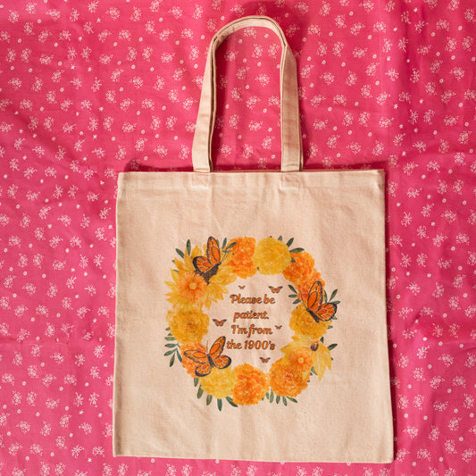 beige, orange and yellow tote bag