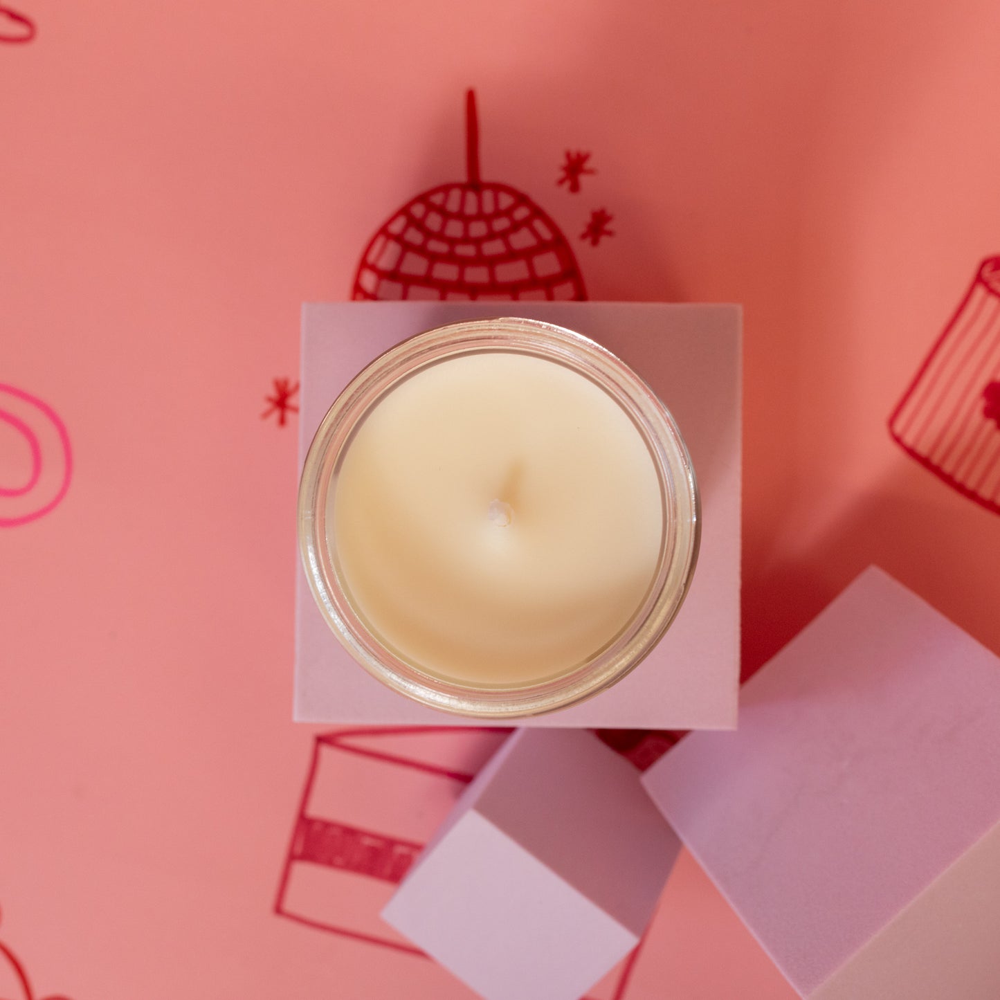 beige top of candle