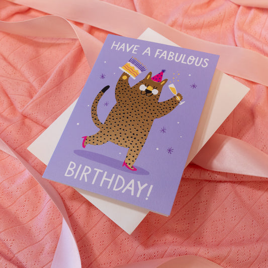 purple card with gold leopard