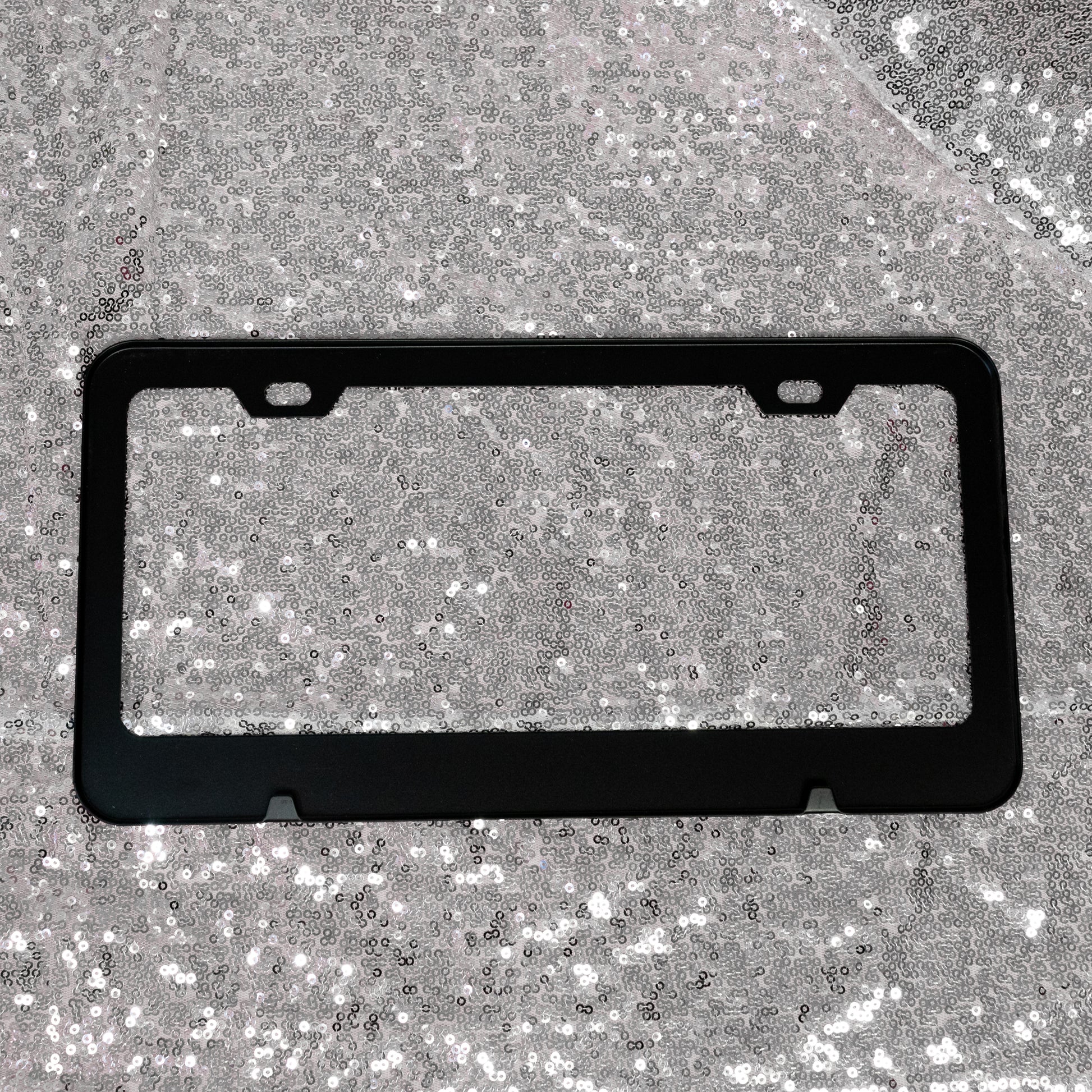 black license plate cover