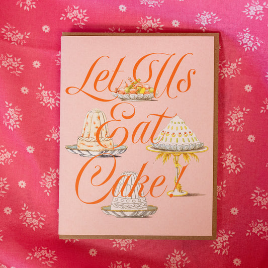 light pink card with cakes and orange words